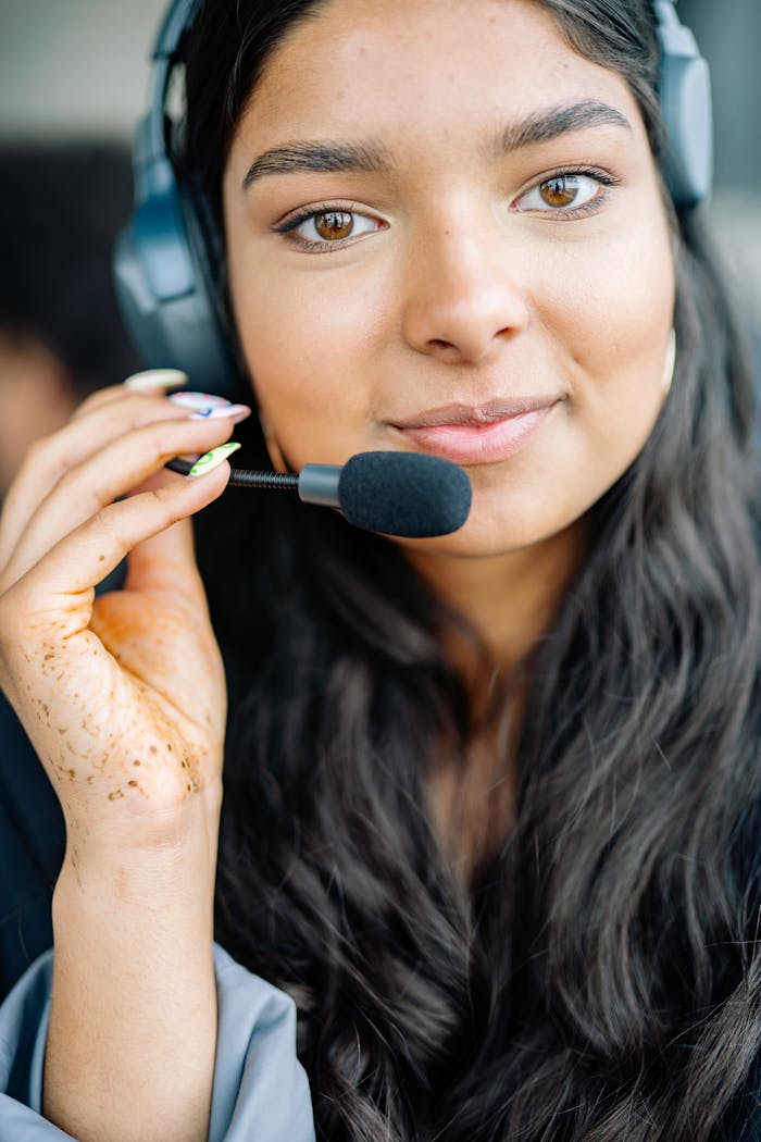 A Woman Wearing Black Headset